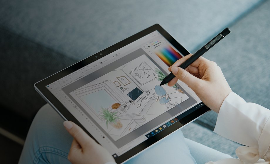 A person using a drawing tablet